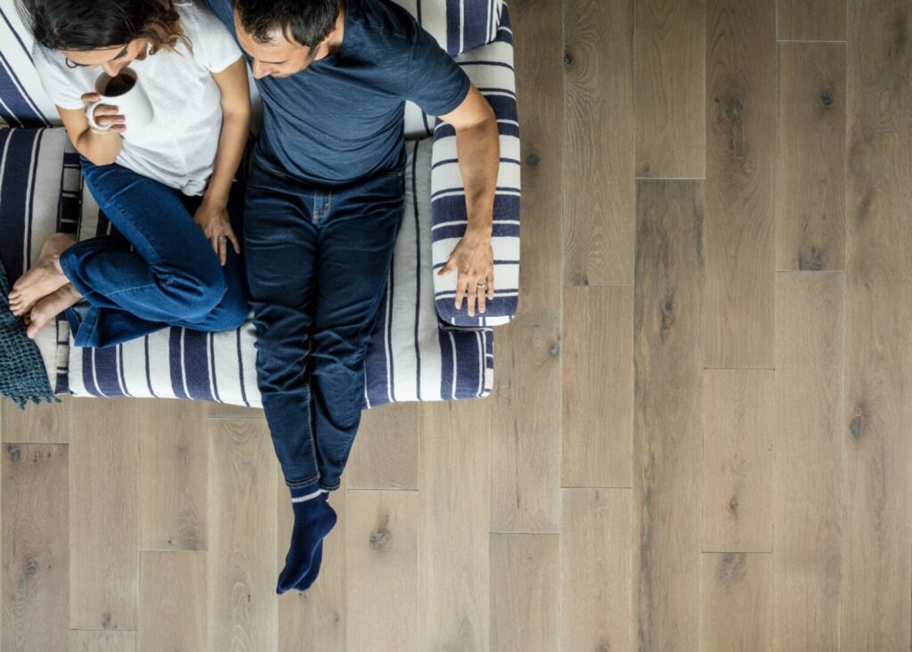 Happy couple enjoying coffee | CarpetsPlus COLORTILE